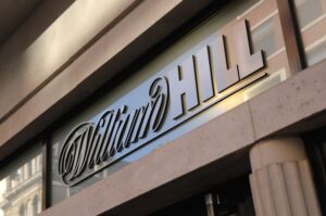 UK – William Hill issues profit warning