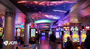 US – JCM creates 80-Foot Curved LED ceiling display for MotorCity Casino