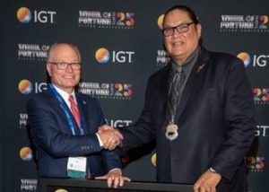 US – IGT celebrates 25th anniversary of Wheel of Fortune Slots with gift presentation to NIGA Chairman