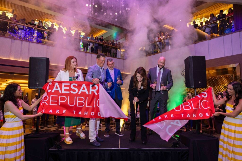 Lisa Vanderpump cuts the ribbon with Karie Hall, Anthony Carano, Gary Carano and Stew Massie